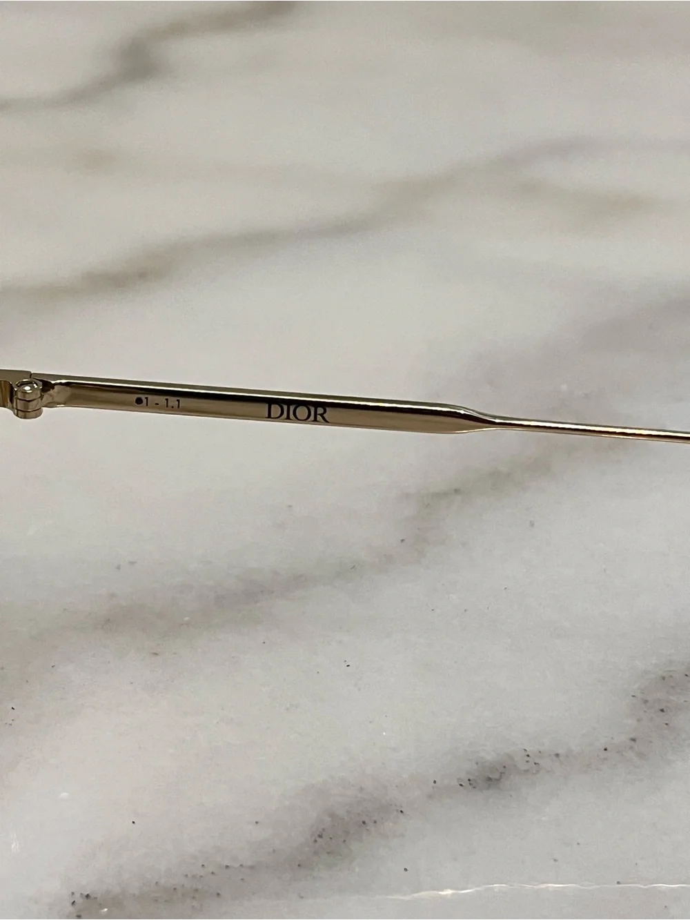 Eyeglasses on Marble Surface